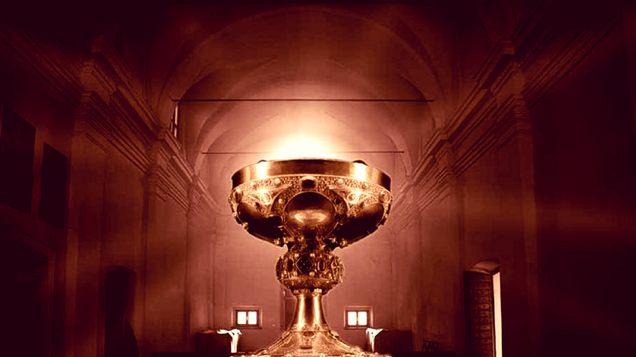 A shiny golden holy grail cup.