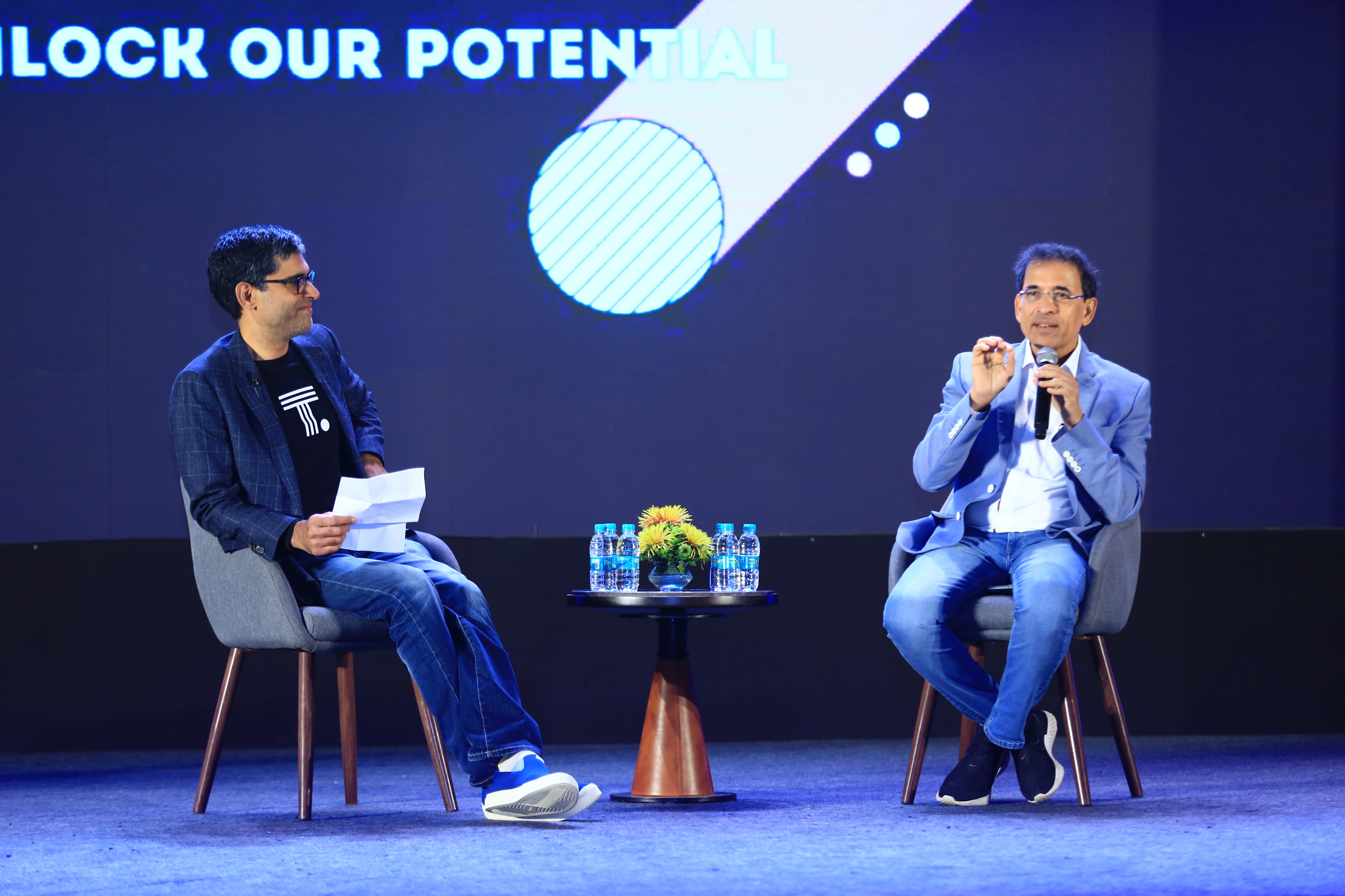 Ajeet Singh speaks with Harsha Bhogle at ThoughtSpot company kickoff in Bangalore